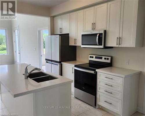 12 Oakmont Drive, Loyalist (Bath), ON - Indoor Photo Showing Kitchen With Double Sink