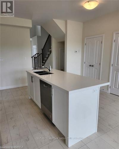 12 Oakmont Drive, Loyalist (Bath), ON - Indoor Photo Showing Kitchen With Double Sink