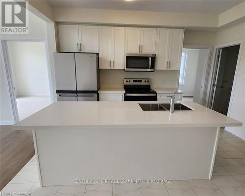 12 Oakmont Drive, Loyalist (Bath), ON - Indoor Photo Showing Kitchen With Double Sink