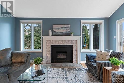 65 Hawley Crescent, Ottawa, ON - Indoor Photo Showing Living Room With Fireplace