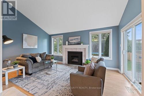 65 Hawley Crescent, Kanata (9004 - Kanata - Bridlewood), ON - Indoor Photo Showing Living Room With Fireplace