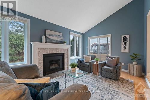 65 Hawley Crescent, Kanata (9004 - Kanata - Bridlewood), ON - Indoor Photo Showing Living Room With Fireplace