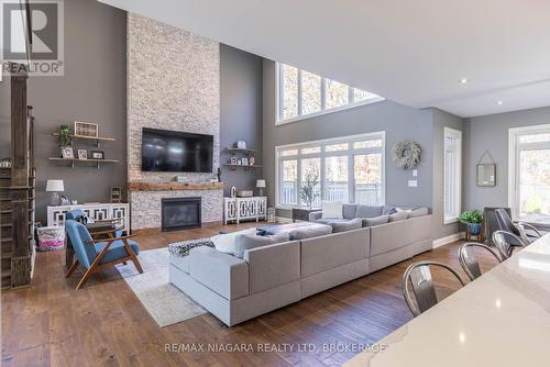 8665 Glavcic Drive, Niagara Falls (219 - Forestview), ON - Indoor Photo Showing Living Room With Fireplace