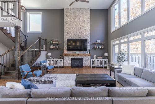 8665 Glavcic Drive, Niagara Falls (219 - Forestview), ON - Indoor Photo Showing Living Room With Fireplace