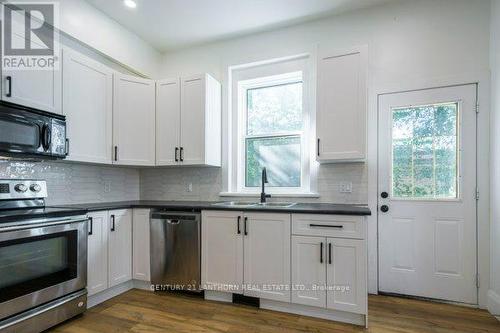 31 Bettes Street, Belleville, ON - Indoor Photo Showing Kitchen With Double Sink