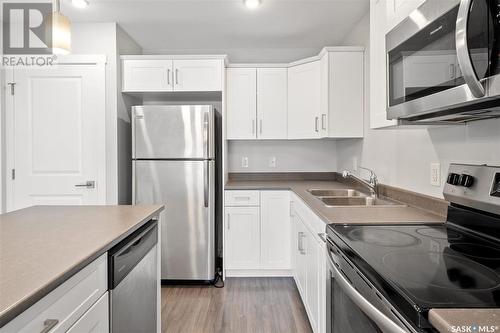 205 315 Dickson Crescent, Saskatoon, SK - Indoor Photo Showing Kitchen With Double Sink