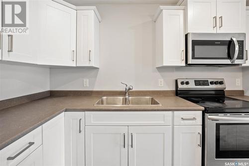 205 315 Dickson Crescent, Saskatoon, SK - Indoor Photo Showing Kitchen With Double Sink