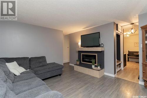 30 Galbraith Crescent, Saskatoon, SK - Indoor Photo Showing Living Room With Fireplace