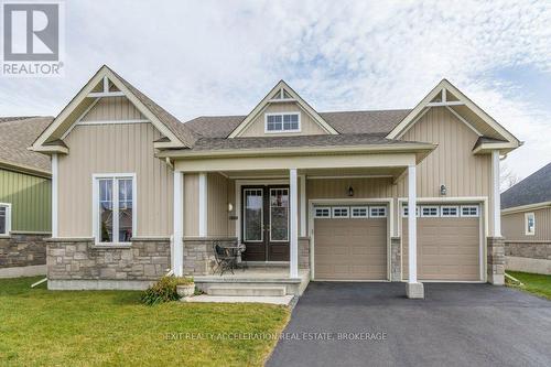 113 Country Club Drive, Loyalist (Bath), ON - Outdoor With Facade