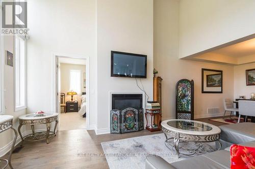 113 Country Club Drive, Loyalist (Bath), ON - Indoor Photo Showing Living Room With Fireplace