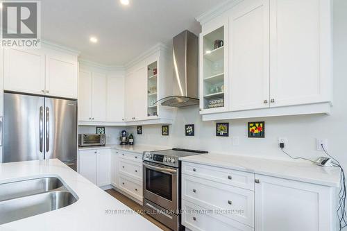 113 Country Club Drive, Loyalist (Bath), ON - Indoor Photo Showing Kitchen With Double Sink