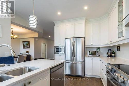 113 Country Club Drive, Loyalist (Bath), ON - Indoor Photo Showing Kitchen With Double Sink