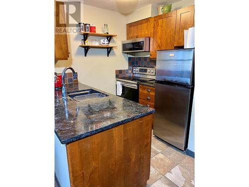 2070 Summit Drive Unit# 404, Panorama, BC - Indoor Photo Showing Kitchen With Double Sink