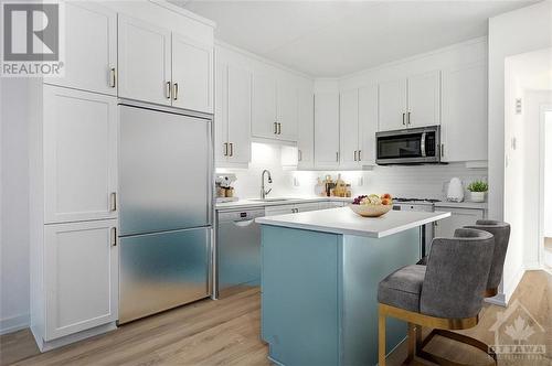 Virtually Staged - 320 Montee Outaouais Street Unit#306, Rockland, ON - Indoor Photo Showing Kitchen With Upgraded Kitchen