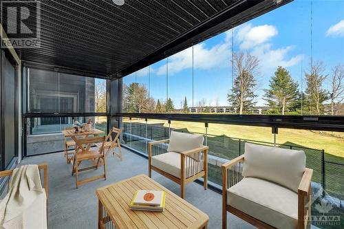 Virtually Staged - 320 Montee Outaouais Street Unit#301, Rockland, ON - Outdoor With Deck Patio Veranda With Exterior