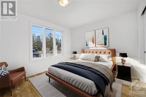 Virtually Staged - 320 Montee Outaouais Street Unit#301, Rockland, ON - Indoor Photo Showing Bedroom