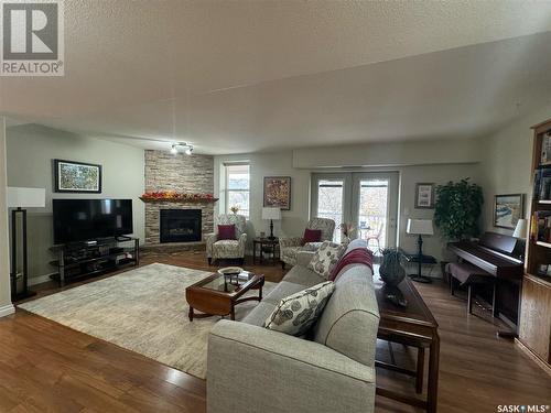 9 600 Broadway Street W, Fort Qu'Appelle, SK - Indoor Photo Showing Living Room With Fireplace