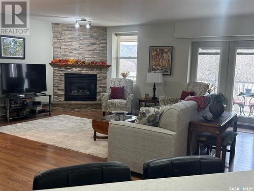 9 600 Broadway Street W, Fort Qu'Appelle, SK - Indoor Photo Showing Living Room With Fireplace