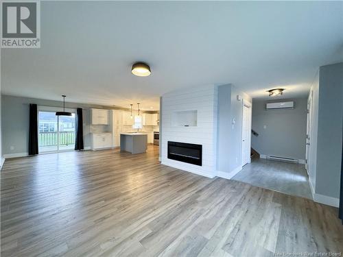 182 Melanie Street, Dieppe, NB - Indoor Photo Showing Living Room With Fireplace