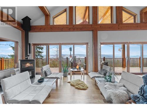 4519 June Springs Road, Kelowna, BC - Indoor Photo Showing Living Room With Fireplace