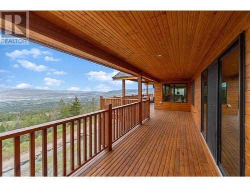 Covered wraparound deck - 4519 June Springs Road, Kelowna, BC - Outdoor With Deck Patio Veranda With Exterior