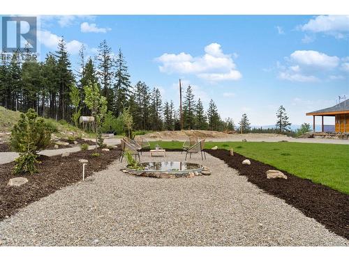 Freshly landscaped+pond - 4519 June Springs Road, Kelowna, BC - Outdoor