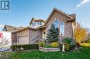 View of front property featuring a front yard and a garage - 613 Black Street, Fergus, ON  - Outdoor 