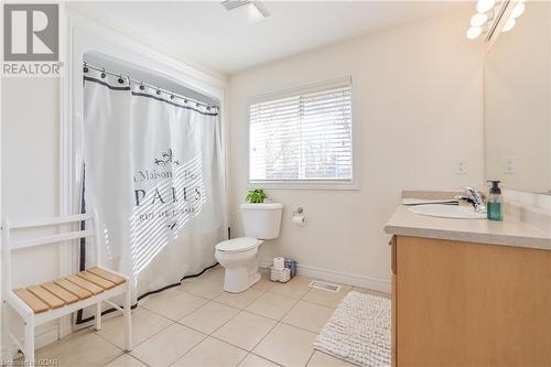 Bathroom with tile patterned floors, vanity, and toilet - 613 Black Street, Fergus, ON - Indoor Photo Showing Bathroom