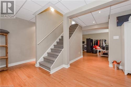 Staircase featuring hardwood / wood-style floors and a drop ceiling - 613 Black Street, Fergus, ON - Indoor Photo Showing Other Room