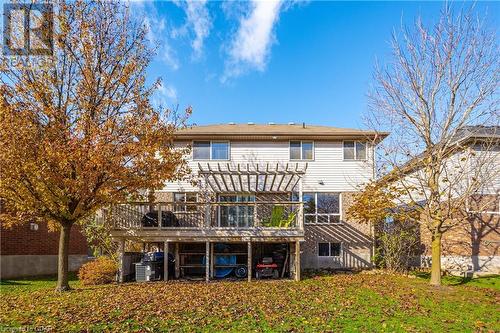 Rear view of house with a yard and a wooden deck - 613 Black Street, Fergus, ON - Outdoor