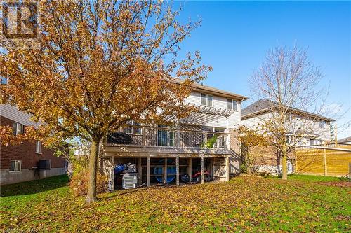 Back of house with a pergola, a wooden deck, and a lawn - 613 Black Street, Fergus, ON - Outdoor