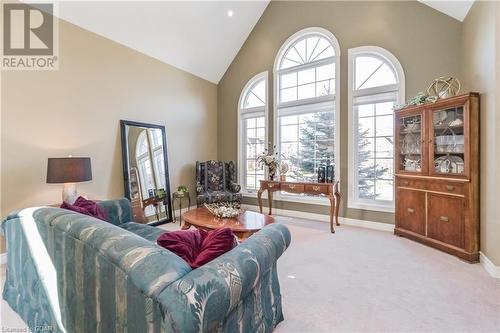 Carpeted living room with high vaulted ceiling - 613 Black Street, Fergus, ON - Indoor Photo Showing Living Room