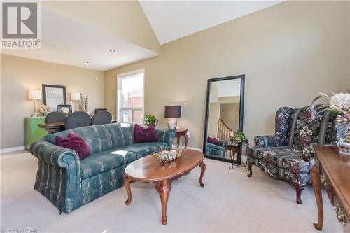 Carpeted living room featuring vaulted ceiling - 613 Black Street, Fergus, ON - Indoor Photo Showing Living Room