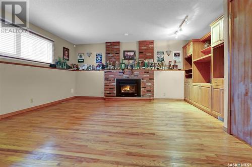 30 Melville Avenue, Regina, SK - Indoor With Fireplace