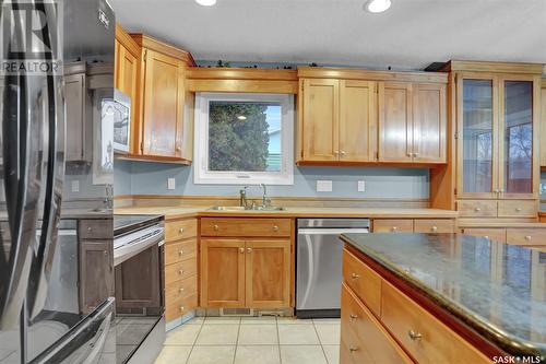 30 Melville Avenue, Regina, SK - Indoor Photo Showing Kitchen With Double Sink