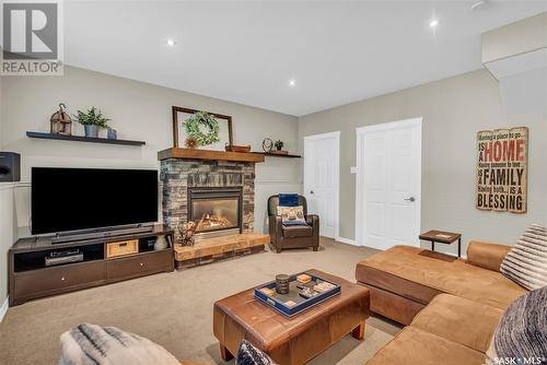 642 Van Impe Terrace, Saskatoon, SK - Indoor Photo Showing Living Room With Fireplace