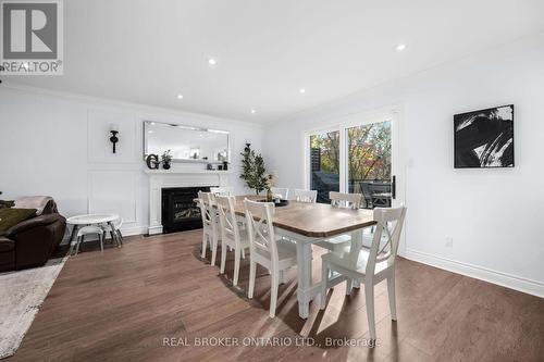 2384 Cummins Lane, Burlington, ON - Indoor Photo Showing Dining Room With Fireplace