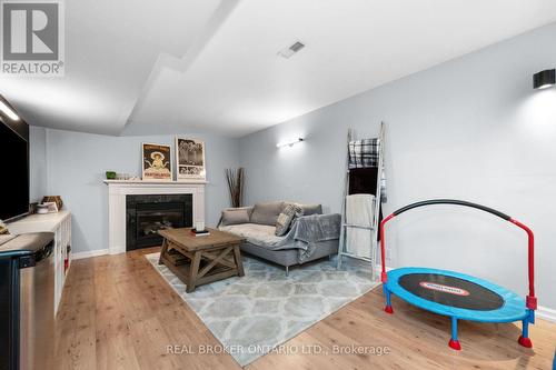 2384 Cummins Lane, Burlington, ON - Indoor Photo Showing Living Room With Fireplace