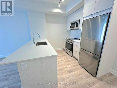 1605 - 4130 Parkside Village Drive, Mississauga, ON - Indoor Photo Showing Kitchen With Stainless Steel Kitchen