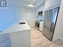 1605 - 4130 Parkside Village Drive, Mississauga, ON  - Indoor Photo Showing Kitchen With Stainless Steel Kitchen 