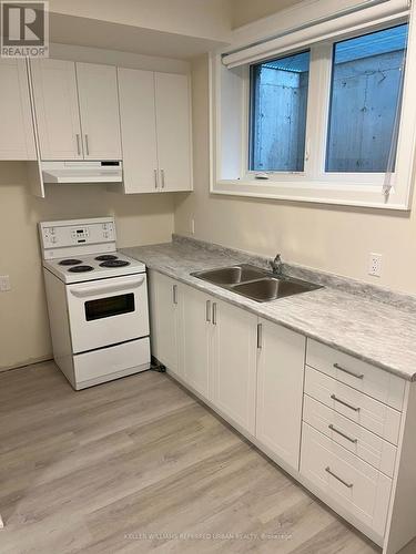 Bsmt - 97 Dell Park Avenue, Toronto, ON - Indoor Photo Showing Kitchen With Double Sink