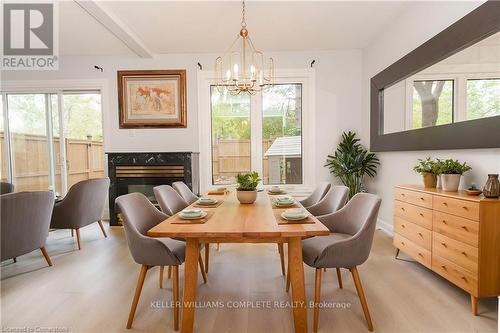 11 - 1270 Gainsborough Drive, Oakville, ON - Indoor Photo Showing Dining Room With Fireplace