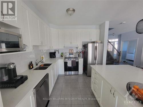 224 Cranesbill Road, Ottawa, ON - Indoor Photo Showing Kitchen With Double Sink With Upgraded Kitchen