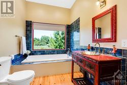 Main floor second bedroom ensuite - 