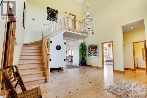 Staircase to second floor - that is all the primary suite retreat - 9868 County Road 42 Road, Westport, ON - Indoor Photo Showing Other Room