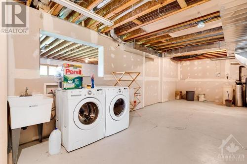 Lower level laundry centre - 9868 County Road 42 Road, Westport, ON - Indoor Photo Showing Laundry Room