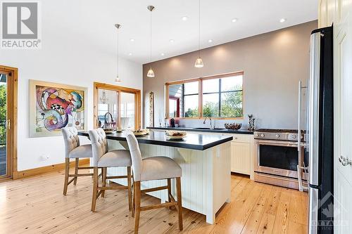 Kitchen island for gatherings - 9868 County Road 42 Road, Westport, ON - Indoor Photo Showing Other Room