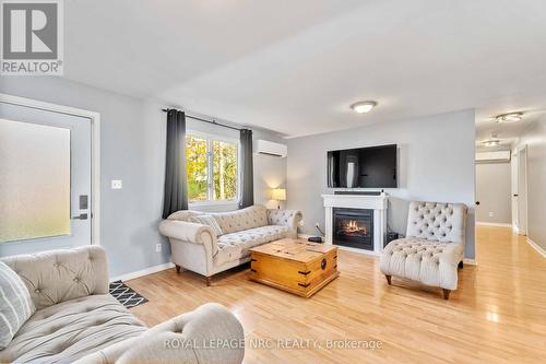 33 Keel Street, Fort Erie (333 - Lakeshore), ON - Indoor Photo Showing Living Room With Fireplace