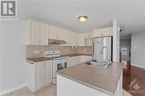 313 Ravenswood Way, Ottawa, ON - Indoor Photo Showing Kitchen With Double Sink