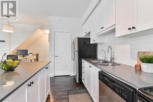 515 - 10 Drummond Street, Toronto, ON - Indoor Photo Showing Kitchen With Double Sink